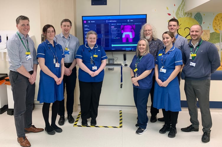 Pictured (left to right): Stephen McCormack - head of radiotherapy physics, Jodie Thompson - specialist therapeutic radiographer, Peter Faulkner - senior clinical scientist, Megan Le Riche - specialist therapeutic radiographer, Jennifer McGrail - senior dosimetrist, Paul Alway - chair, Somerset Unit for Radiotherapy Equipment, Sarah Kushnaryova - clinical section lead, Graham Lockwood - senior clinical scientist, Stuart McGrail - deputy head of radiotherapy services.